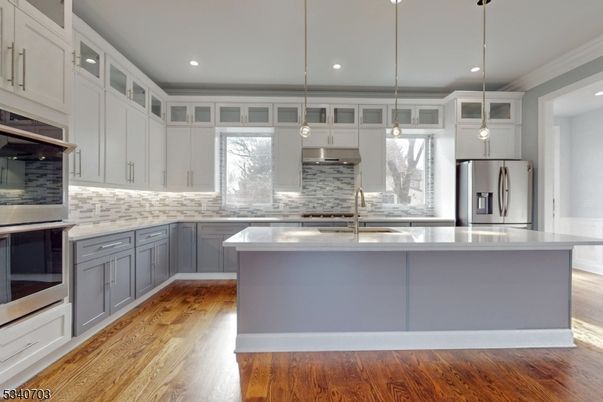 Interior, Kitchen, Pendant Lights, Recessed Lighting, Stainless Steel Appliances, Wood Texture Flooring