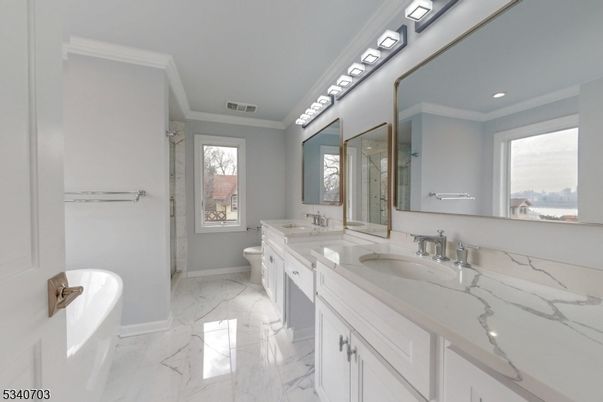 Bathroom, Dual Sink Vanities, Glass Shower, Interior, Marble, Recessed Lighting