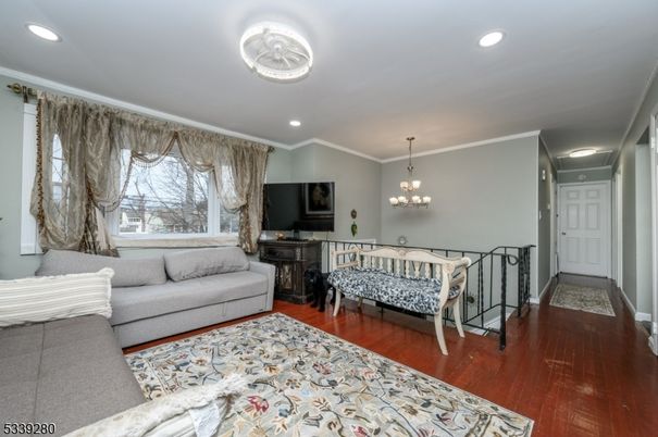 Bedroom, Chandelier, Interior, Living room, Recessed Lighting, Wood Texture Flooring