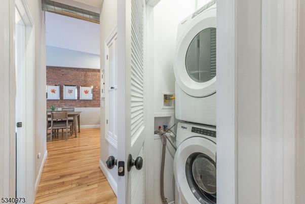 Dining room, Interior, Stone Walls, Utility Closets, Washer, Wood Texture Flooring