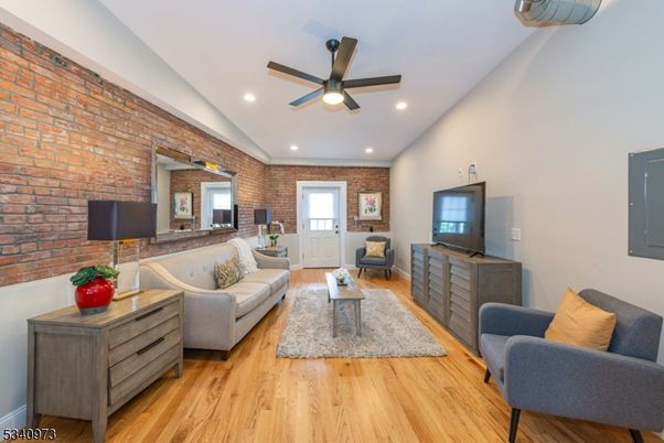 Interior, Living room, Recessed Lighting, Stone Walls, Wood Texture Flooring