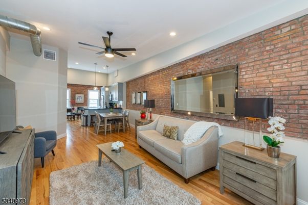 Dining room, Interior, Kitchen, Living room, Pendant Lights, Recessed Lighting, Stone Walls, Wood Texture Flooring