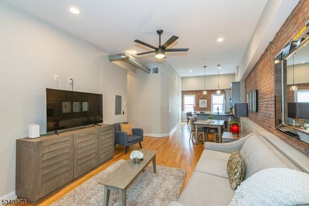 Dining room, Interior, Kitchen, Living room, Pendant Lights, Recessed Lighting, Stone Walls, Wood Texture Flooring