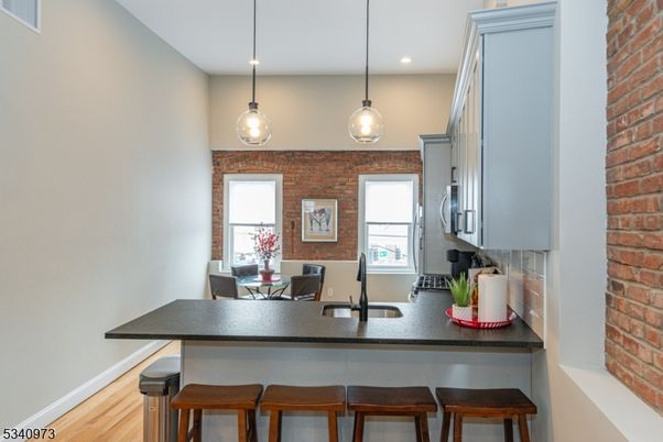 Dining room, Interior, Kitchen, Pendant Lights, Recessed Lighting, Stone Walls, Wood Texture Flooring