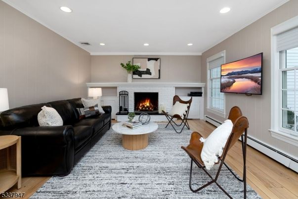 Fireplace, Interior, Living room, Recessed Lighting, Wood Texture Flooring