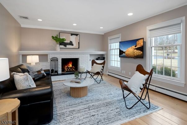 Fireplace, Interior, Living room, Recessed Lighting, Wood Texture Flooring