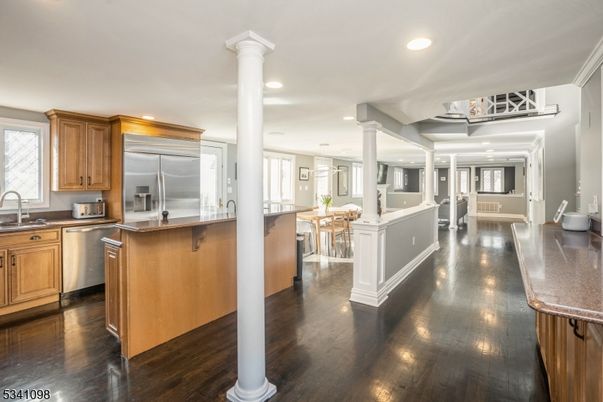 Dining room, Interior, Kitchen, Recessed Lighting, Stainless Steel Appliances, Wood Texture Flooring