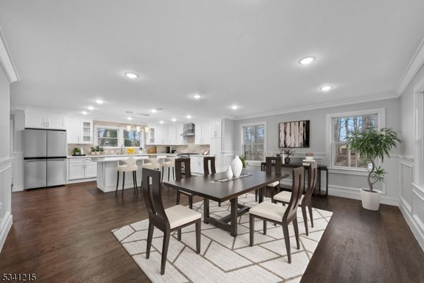 Dining room, Interior, Kitchen, Recessed Lighting, Stainless Steel Appliances, Wood Texture Flooring