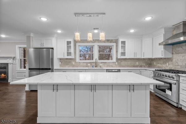 Fireplace, Interior, Kitchen, Pendant Lights, Recessed Lighting, Stainless Steel Appliances, Wood Texture Flooring
