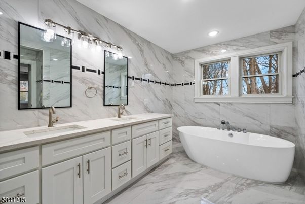 Bathroom, Dual Sink Vanities, Free Standing Baths, Interior, Marble, Marble Walls, Recessed Lighting
