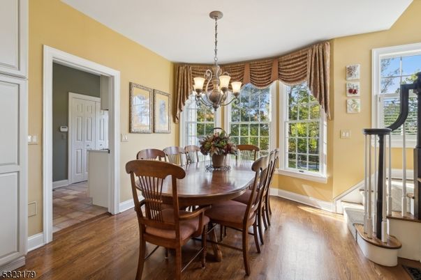 Chandelier, Dining room, Interior, Wood Texture Flooring