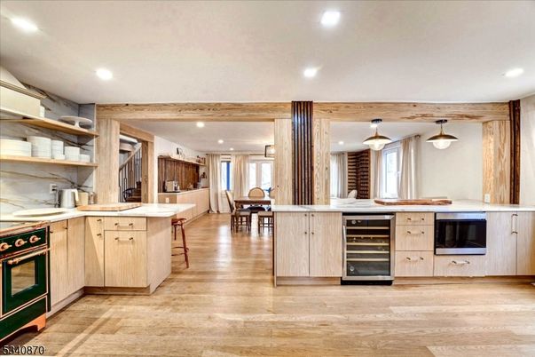 Dining room, Interior, Kitchen, Pendant Lights, Recessed Lighting, Stainless Steel Appliances, Wooden Beams, Wood Texture Flooring