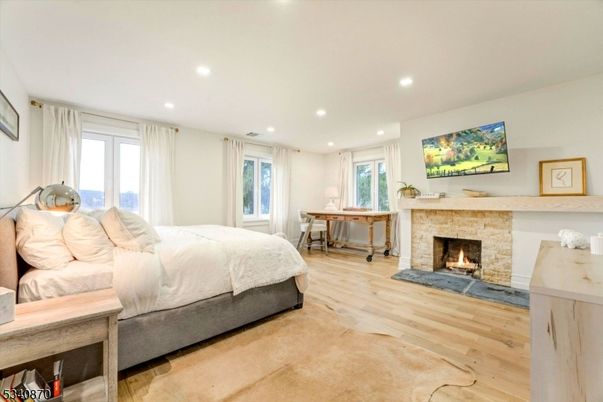 Bedroom, Fireplace, Interior, Recessed Lighting, Wood Texture Flooring