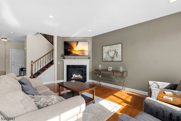 Fireplace, Interior, Living room, Recessed Lighting, Wood Texture Flooring
