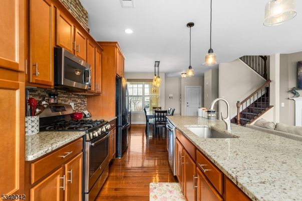 Dining room, Interior, Kitchen, Pendant Lights, Recessed Lighting, Stainless Steel Appliances, Wood Texture Flooring