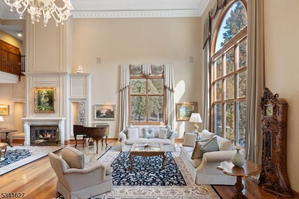 Chandelier, Fireplace, Interior, Living room, Piano, Wood Texture Flooring