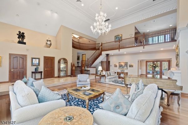 Chandelier, Interior, Living room, Piano, Recessed Lighting, Wood Texture Flooring