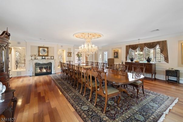 Chandelier, Dining room, Fireplace, Interior, Wood Texture Flooring