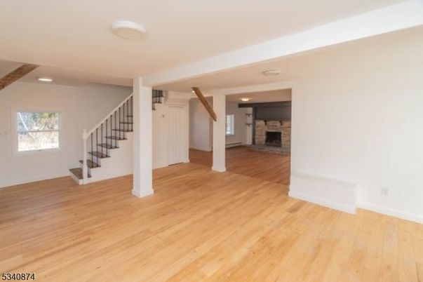 Empty room, Fireplace, Interior, Recessed Lighting, Wood Texture Flooring