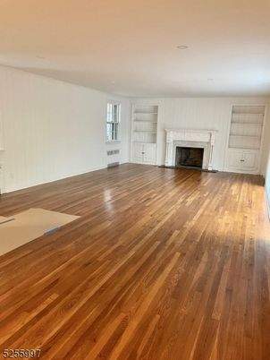 Empty room, Fireplace, Interior, Recessed Lighting, Wood Texture Flooring