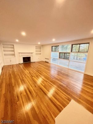 Empty room, Fireplace, Interior, Recessed Lighting, Wood Texture Flooring