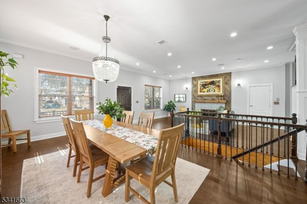 Chandelier, Dining room, Fireplace, Interior, Recessed Lighting, Wood Texture Flooring