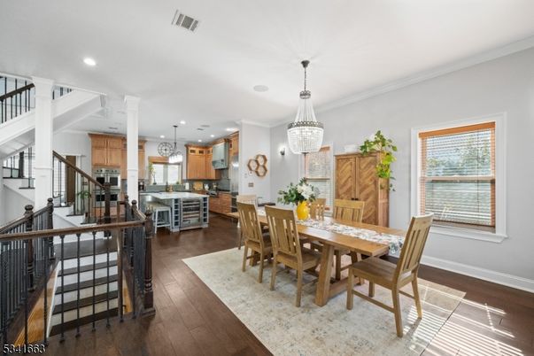 Chandelier, Dining room, Interior, Kitchen, Pendant Lights, Recessed Lighting, Stainless Steel Appliances, Wood Texture Flooring