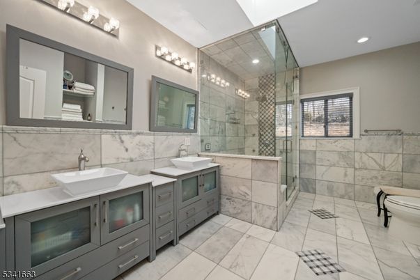 Bathroom, Dual Sink Vanities, Glass Shower, Interior, Marble, Recessed Lighting