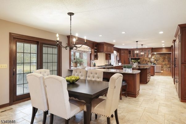Chandelier, Dining room, Interior, Kitchen, Pendant Lights, Recessed Lighting, Stainless Steel Appliances
