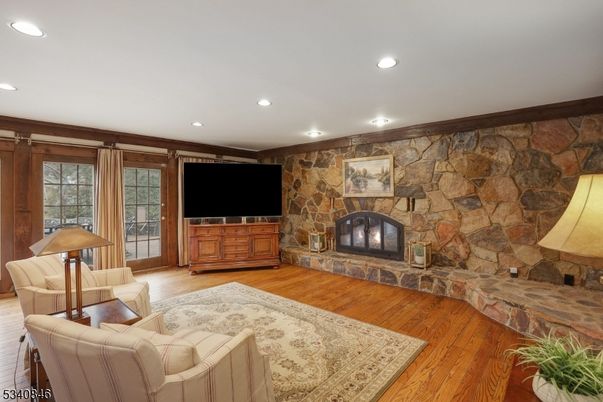 Fireplace, Interior, Recessed Lighting, Stone Walls, Wood Texture Flooring