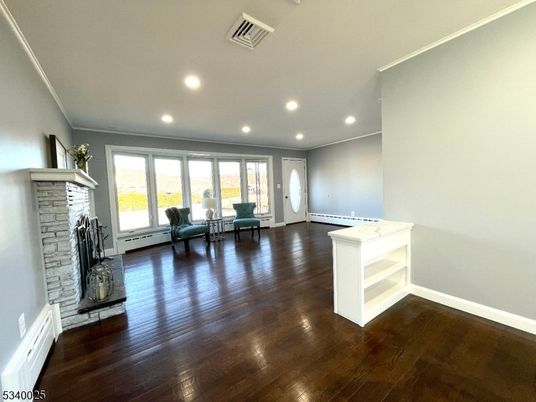 Empty room, Fireplace, Interior, Recessed Lighting, Wood Texture Flooring