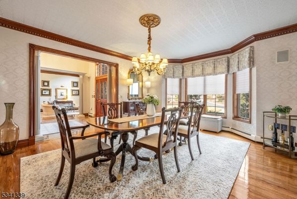 Chandelier, Dining room, Interior, Wood Texture Flooring