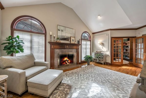 Bedroom, Fireplace, Interior, Living room, Recessed Lighting, Wood Texture Flooring