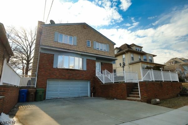 Attached, Exterior, Facade, Brick Facade, Rowhouse