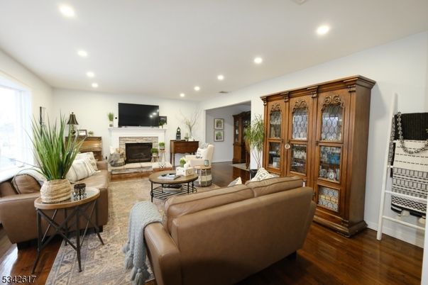 Fireplace, Interior, Living room, Recessed Lighting, Wood Texture Flooring