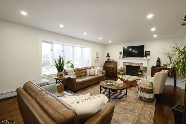 Fireplace, Interior, Living room, Recessed Lighting, Wood Texture Flooring