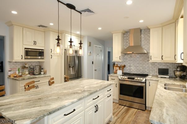 Interior, Kitchen, Pendant Lights, Recessed Lighting, Stainless Steel Appliances, Wood Texture Flooring