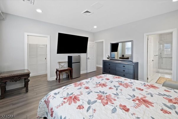 Bathroom, Bedroom, Glass Shower, Interior, Recessed Lighting, Wood Texture Flooring