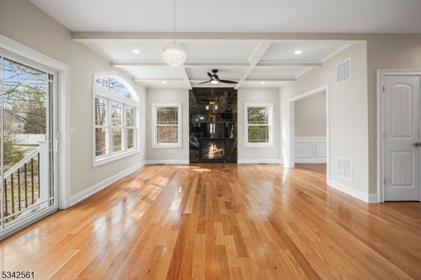 Empty room, Fireplace, Interior, Pendant Lights, Recessed Lighting, Wood Texture Flooring