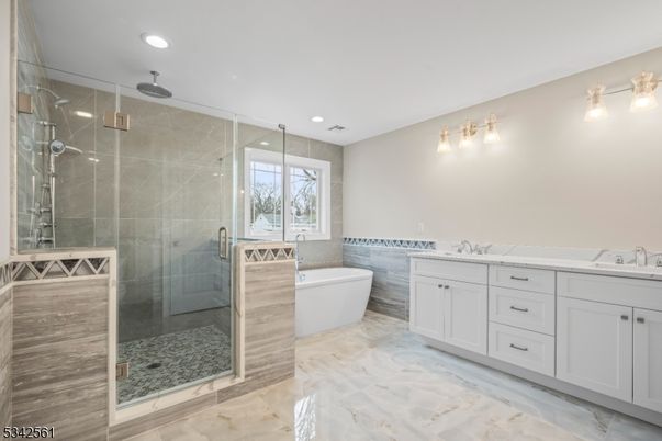 Bathroom, Dual Sink Vanities, Free Standing Baths, Glass Shower, Interior, Marble, Recessed Lighting