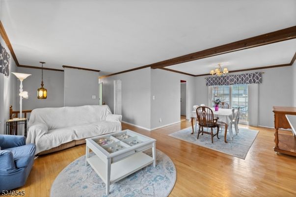 Chandelier, Dining room, Interior, Living room, Pendant Lights, Wooden Beams, Wood Texture Flooring