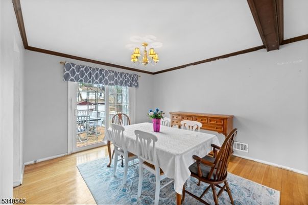 Chandelier, Dining room, Interior, Wood Texture Flooring