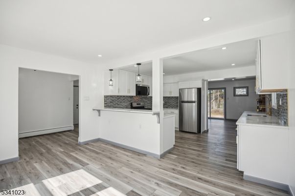Interior, Kitchen, Pendant Lights, Recessed Lighting, Stainless Steel Appliances, Wood Texture Flooring