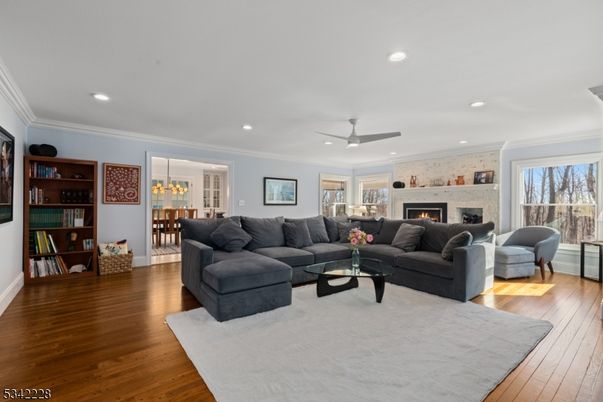 Dining room, Fireplace, Interior, Living room, Pendant Lights, Recessed Lighting, Wood Texture Flooring