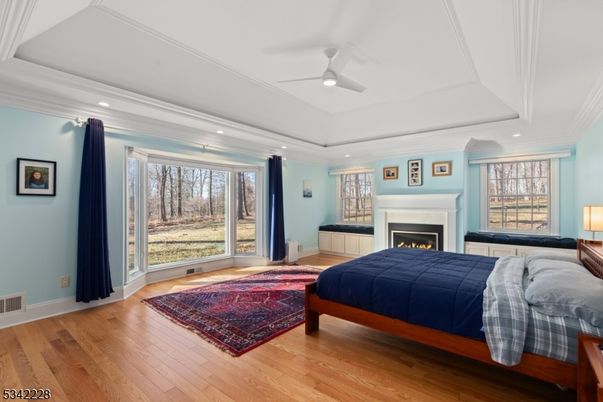 Bedroom, Fireplace, Interior, Recessed Lighting, Wood Texture Flooring