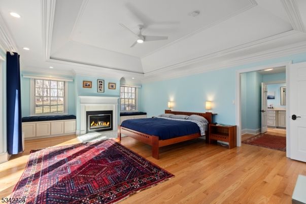 Bedroom, Fireplace, Interior, Recessed Lighting, Wood Texture Flooring