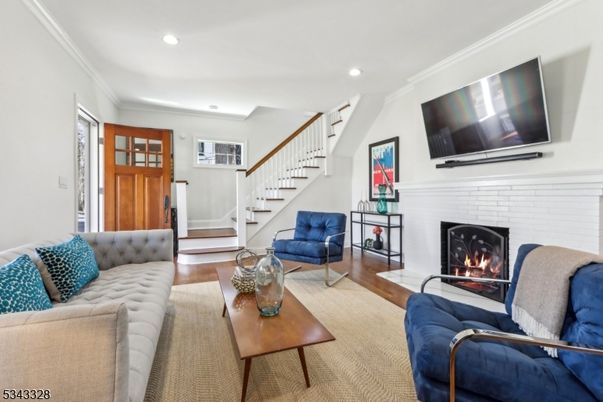 Fireplace, Interior, Living room, Recessed Lighting, Wood Texture Flooring