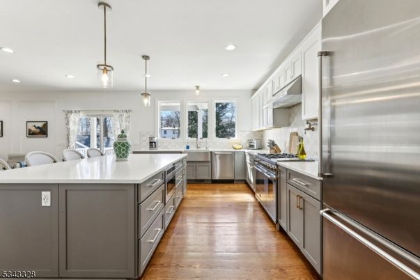 Interior, Kitchen, Pendant Lights, Recessed Lighting, Stainless Steel Appliances, Wood Texture Flooring