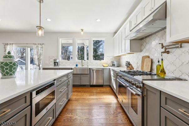 Interior, Kitchen, Pendant Lights, Recessed Lighting, Stainless Steel Appliances, Wood Texture Flooring