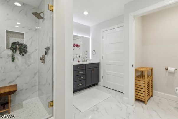 Bathroom, Glass Shower, Interior, Marble, Marble Walls, Recessed Lighting